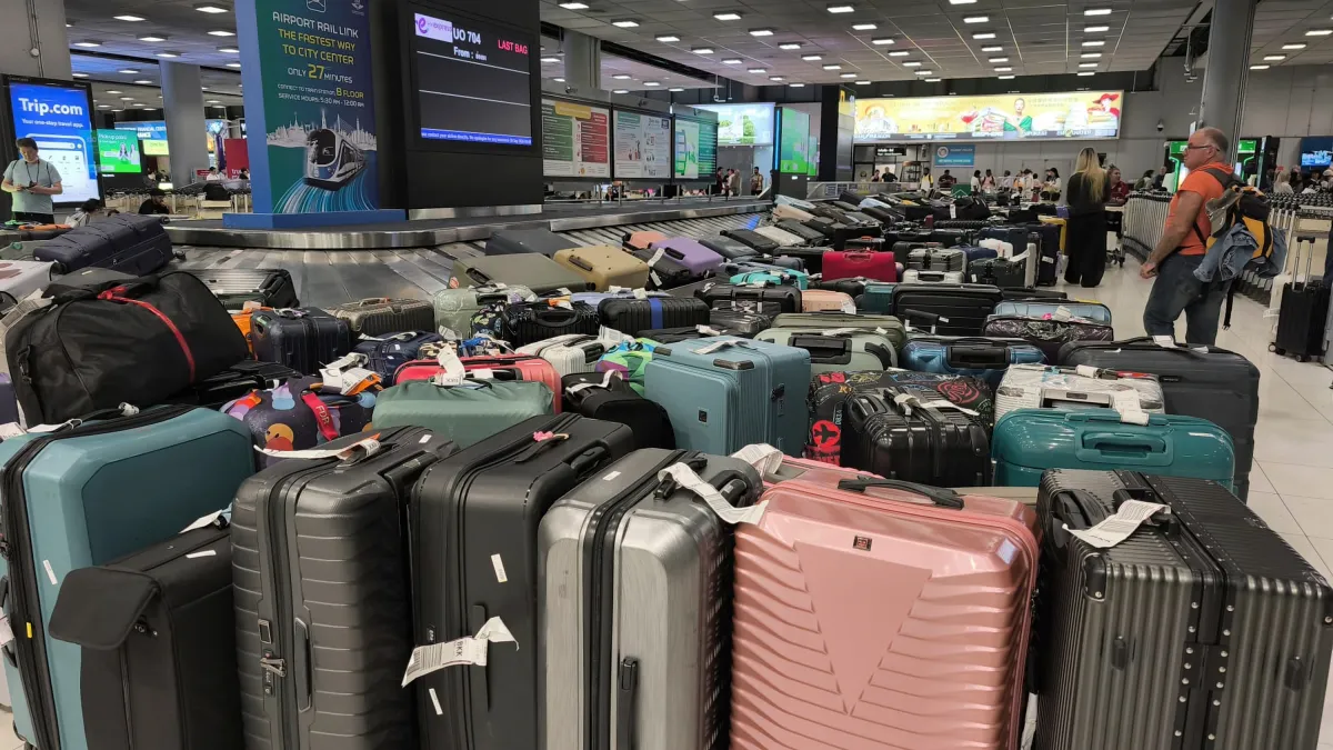 Delayed baggage piles up at Suvarnabhumi Airport in Bangkok on September 29, 2026, after flooding disrupted Thai Airways' ground operations. (AP)