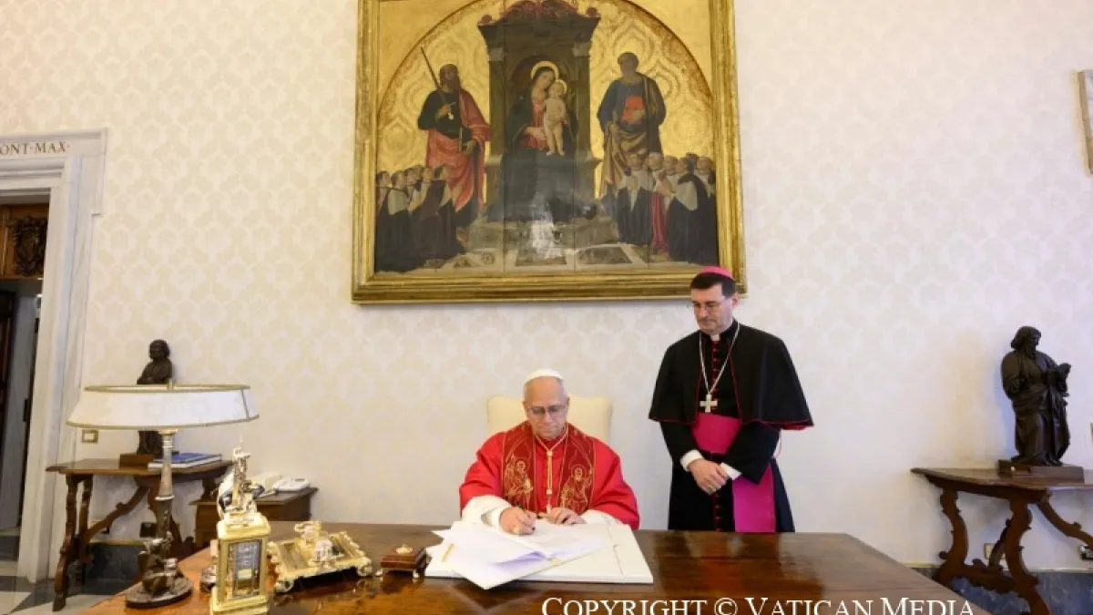 Pope Leo XIV signs Magnifica Humanitas at the Vatican on May 15, 2026. The encyclical, released publicly ten days later, calls for stronger global governance of artificial intelligence. (Photo: Vatican Media)
