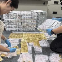 Investigators cracked a case involving a prominent lawyer and a religious figure who allegedly defrauded Tzu Chi of NT$1 billion in a vaccine procurement scheme, laundering the proceeds through gold. Authorities seized 158 kilograms of gold bars, with a m Investigators cracked a case involving a prominent lawyer and a religious figure who allegedly defrauded Tzu Chi of NT$1 billion in a vaccine procurement scheme, laundering the proceeds through gold. Authorities seized 158 kilograms of gold bars, with a m