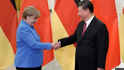 2018年5月24日中國國家主席習近平在北京人民大會堂會見德國總理梅克爾。(美聯社)