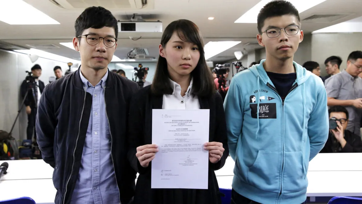 Demosisto founding members Nathan Law, Joshua Wong and Agnes Chow announced the party's dissolution hours after the national security law took effect, the period now central to Wong's guilty plea.