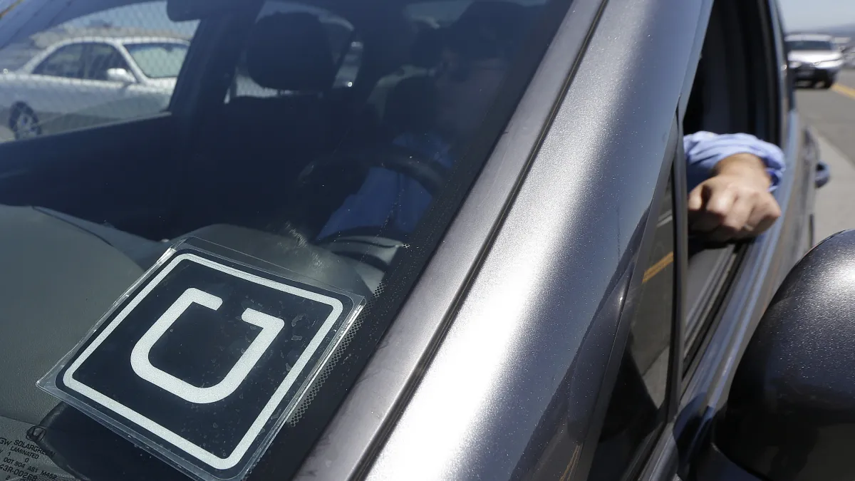 交通部長賀陳旦於13日會談中重申「保障合法、取締非法」、要求Uber「納管、納稅、納保險」立場不變。(資料照,美聯社)
