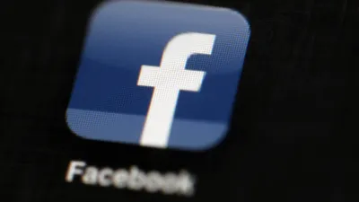 臉書(Facebook)即時通訊軟體Messenger今天晚間傳出當機,許多使用者無法看訊息。(資料照,美聯社)