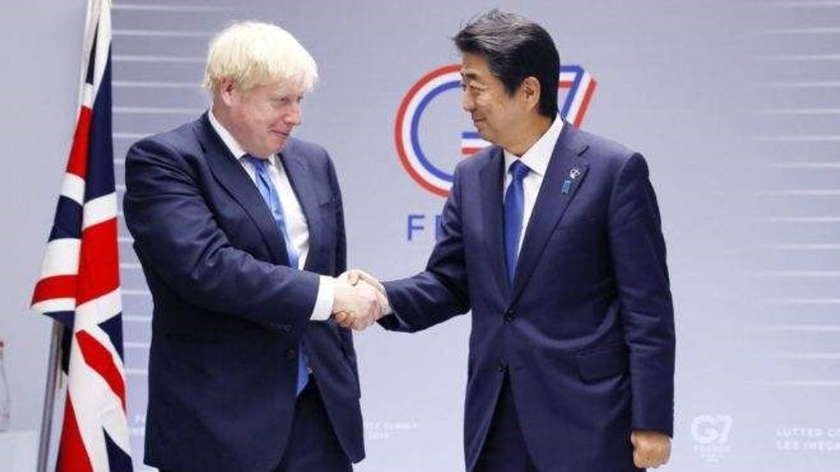 英國首相Boris Johnson(左)與日本前首相安倍晉三(右)(劉瑞思提供) 英國首相Boris Johnson(左)與日本前首相安倍晉三(右)(劉瑞思提供)