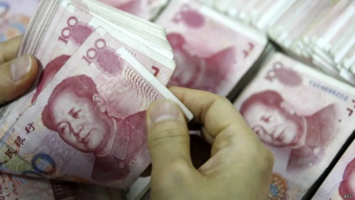 人民幣與美元,是台灣存款戶最熱衷持有的兩種外幣(圖片來源:BBC中文網)