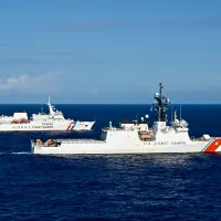 China's gray-zone harassment has intensified in recent years. AIT released a rare photograph showing Taiwan's Coast Guard and the U.S. Coast Guard sailing in formation. (Source: AIT Facebook) China's gray-zone harassment has intensified in recent years. AIT released a rare photograph showing Taiwan's Coast Guard and the U.S. Coast Guard sailing in formation. (Source: AIT Facebook)