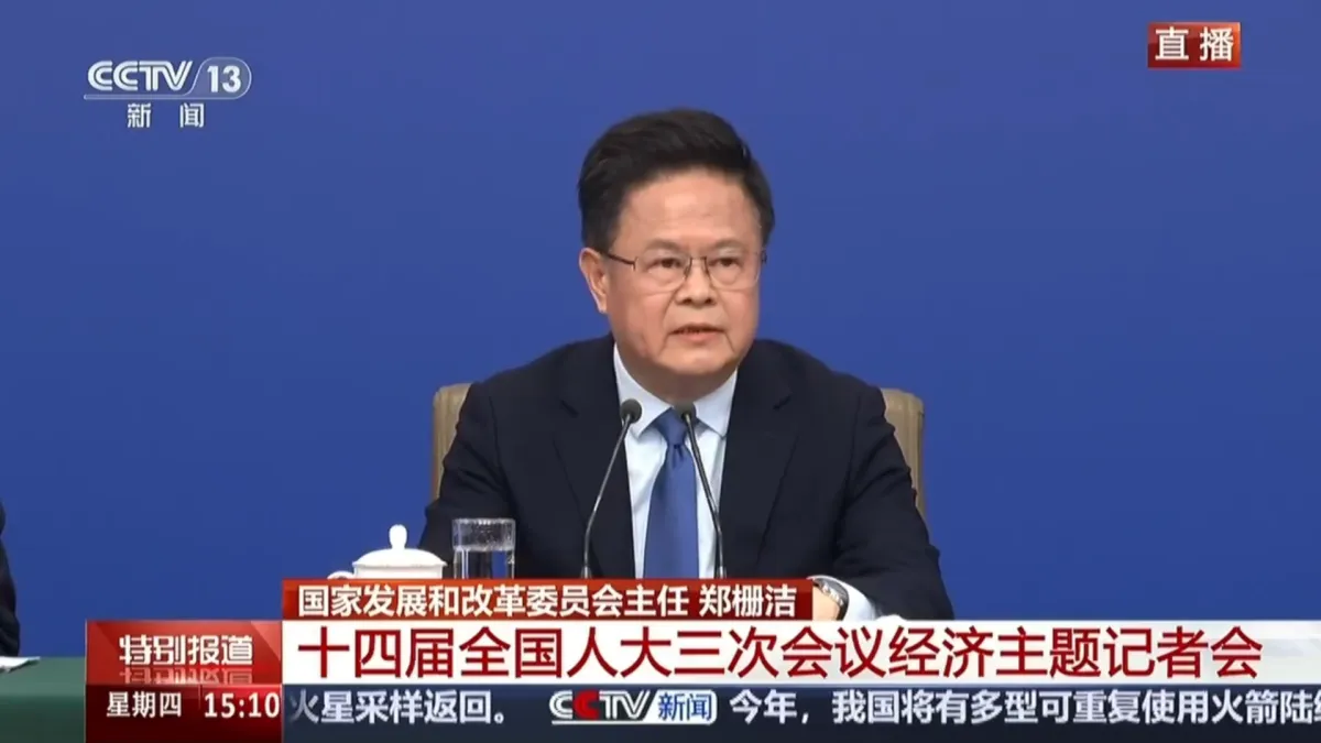 中國國家發改委鄭柵潔與業者座談,要求民企支持決策,頗有「經濟備戰」的味道。(資料照∕截自央視)