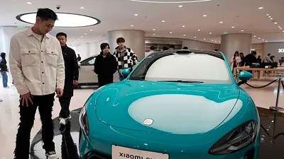 美國對中國進口價值180億美元包括電動車等產品,加徵關稅,會有多大衝擊?圖為小米首款電動車SU7。(美聯社)