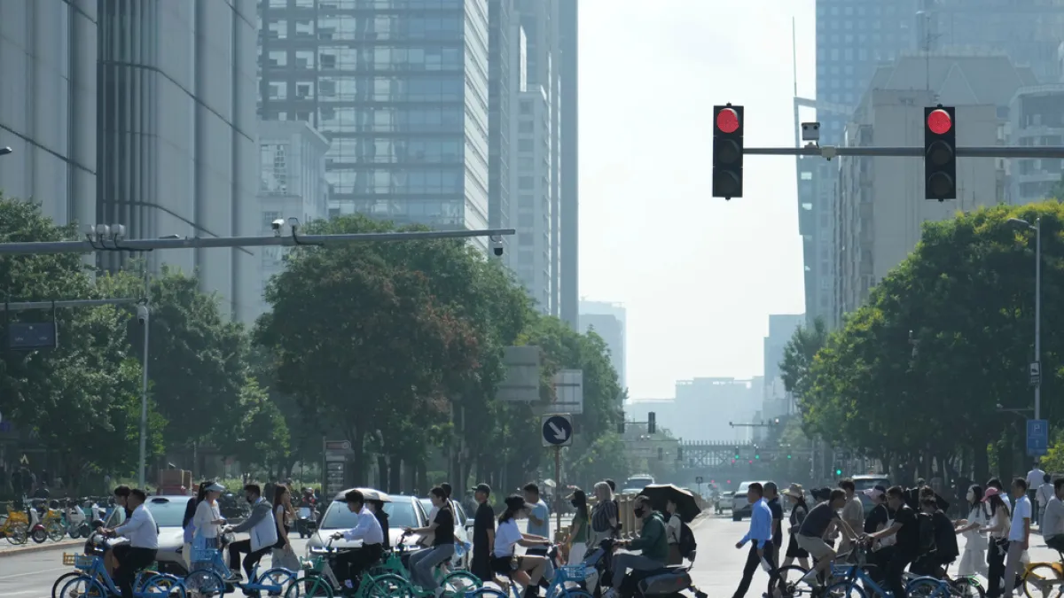 The exit-entry management regulations published by China's State Council are officially framed as protecting Chinese citizens abroad. (File photo, AP)