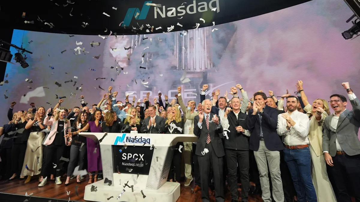 SpaceX employees celebrate during the bell-ringing ceremony for the company's initial public offering (IPO) at the Nasdaq Exchange in New York on June 12, 2026. (AP)