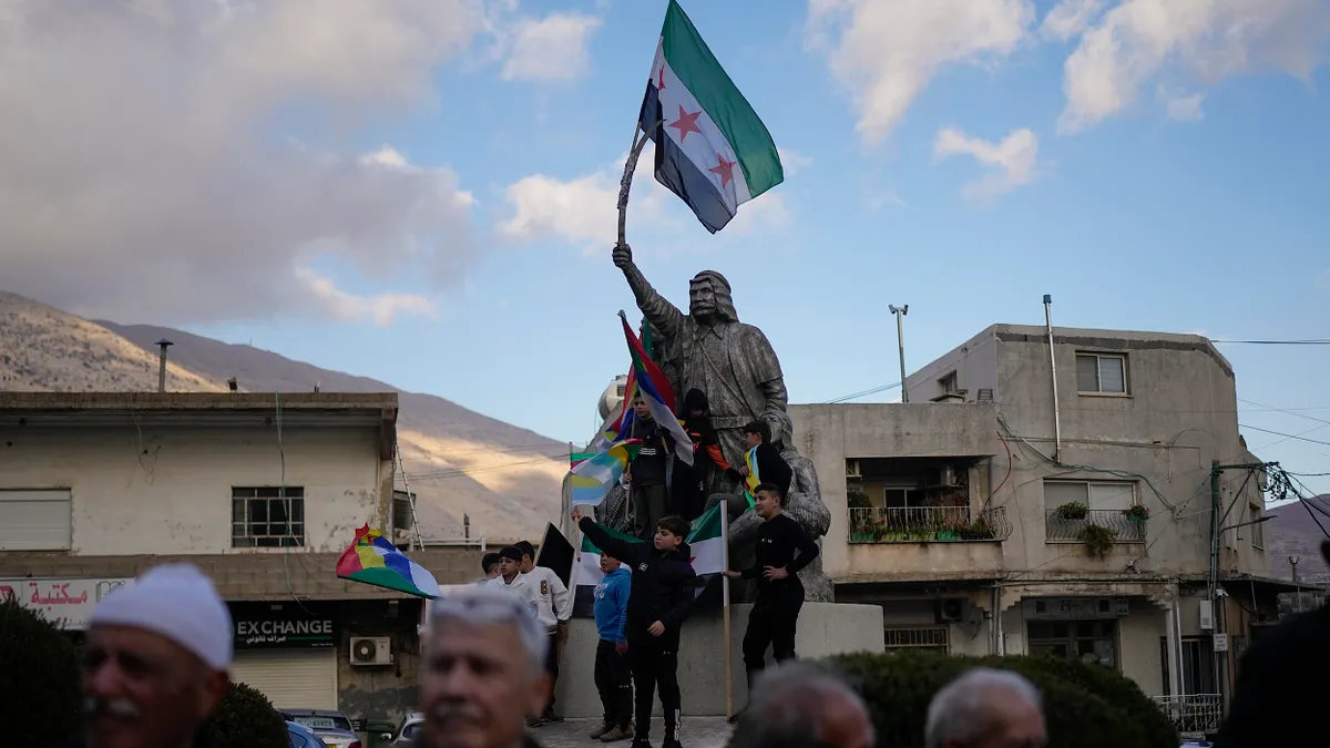 以色列在佔領的戈蘭高地慶祝阿塞德垮台。(美聯社) 以色列在佔領的戈蘭高地慶祝阿塞德垮台。(美聯社)