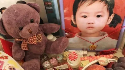 小周洋的遺照。