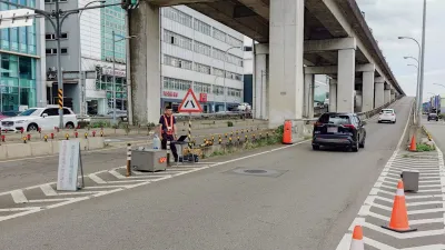 北市環保局於市區道路架設車輛遙測設備,同時結合車牌辨識技術比對車籍資料,大幅提升稽查效率。(圖/臺北市政府環保局提供)