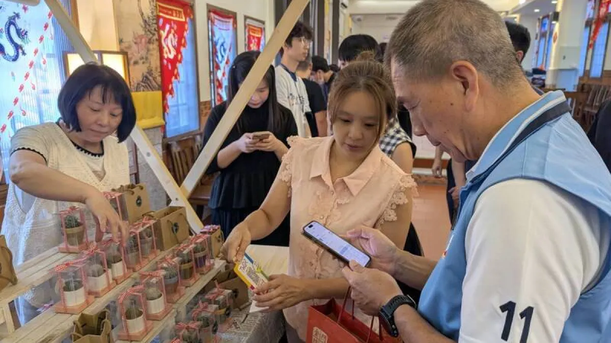 TWQR整合多家電支與銀行付款,店家一張收款碼就能收多種行動支付。(中央社記者吳玟嶸)