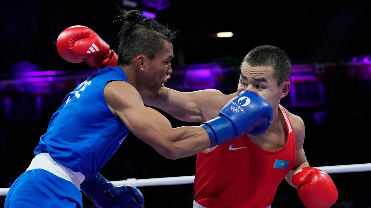 台灣拳擊好手賴主恩(左)在巴黎奧運男子63.5公斤級賽事落敗。(美聯社) 台灣拳擊好手賴主恩(左)在巴黎奧運男子63.5公斤級賽事落敗。(美聯社)