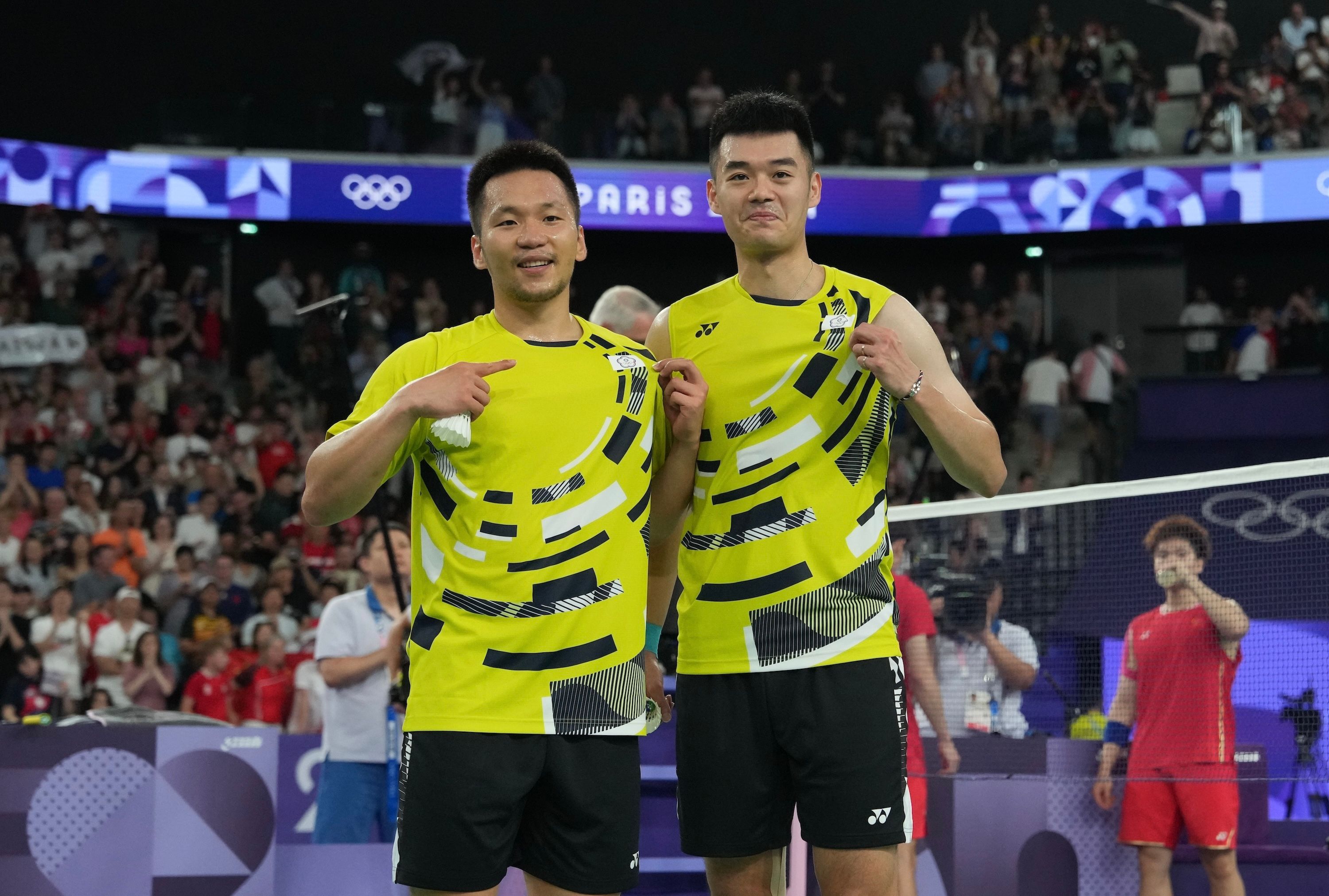 李洋與王齊麟4日在巴黎奧運奪金，達成羽球男雙奧運二連霸。（中華奧會提供）