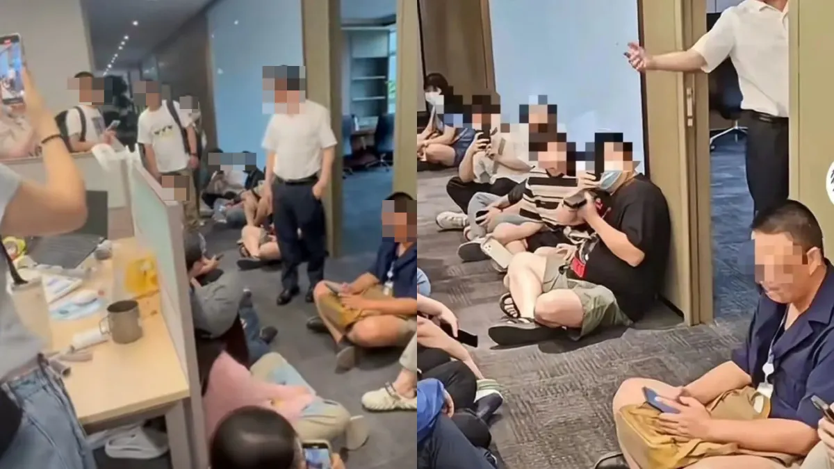 哪吒汽車員工不滿遭欠薪，圍堵在上海虹橋辦公室外。（圖／翻攝自微博）