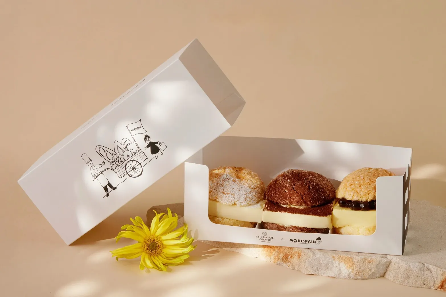 20250809-福岡MOROPAIN與台北喜來登推出「福岡人氣蜜瓜包禮盒」，除了香港人氣「提拉米蘇蜜瓜包」，更有主廚專為台灣打造限定口味「芒果珍珠蜜瓜包」和「荔枝椰果蜜瓜包」。（台北喜來登大飯店提供）