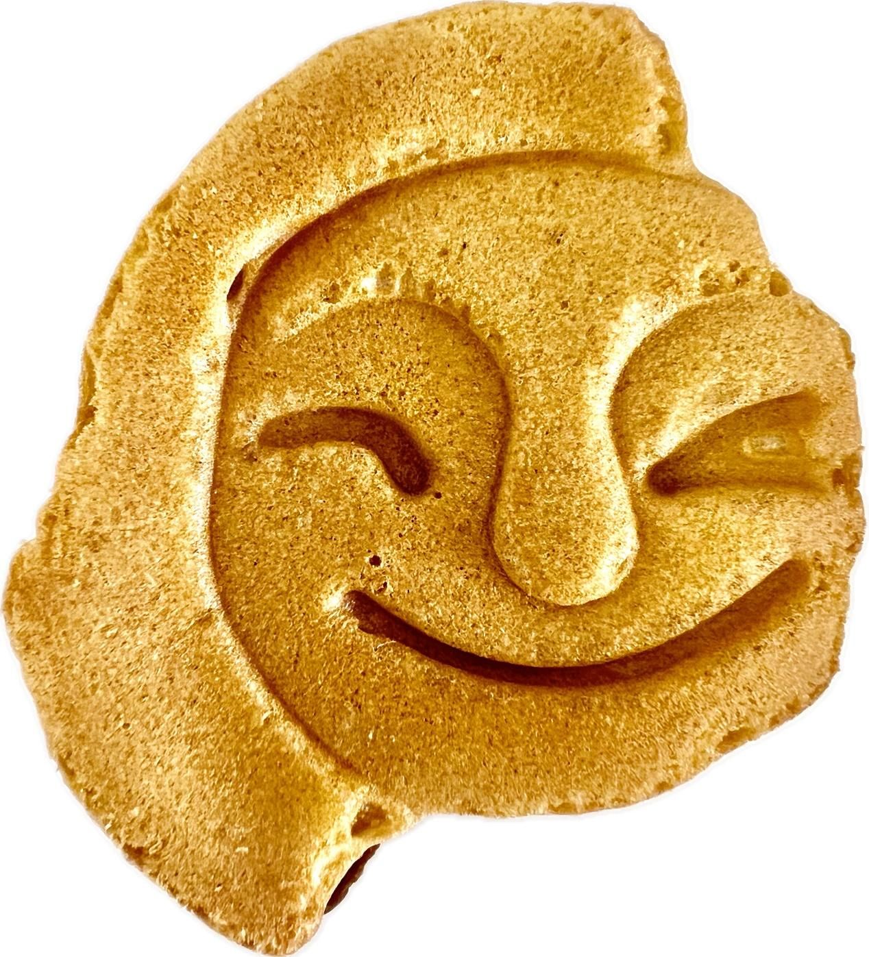 以「人面文瓦當」靈感製作的「臉龐麵包」。（作者提供）