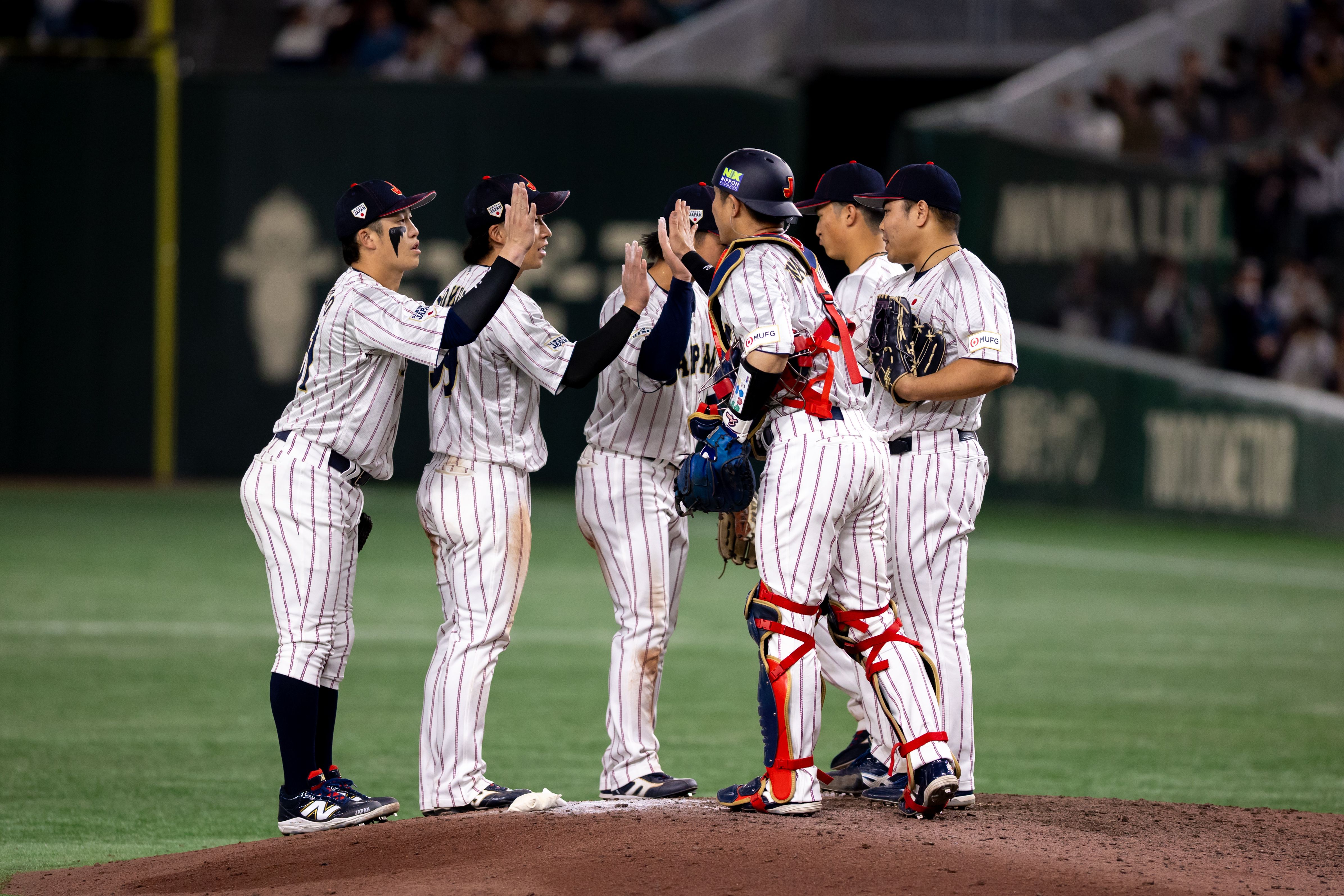 日本は韓国との強化試合で11―4と快勝し、岸田行倫の代打3ランが勝負を分けた。丁勤紜