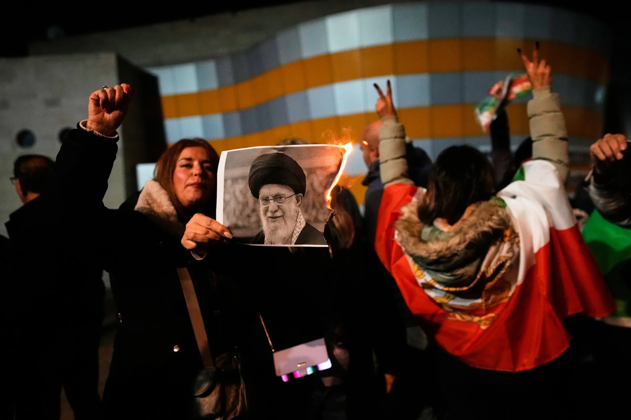 January 14, 2026: Israeli demonstrators burn portraits of Iranian Supreme Leader Khamenei at a rally supporting Iranian anti-government protests. (Associated Press)
