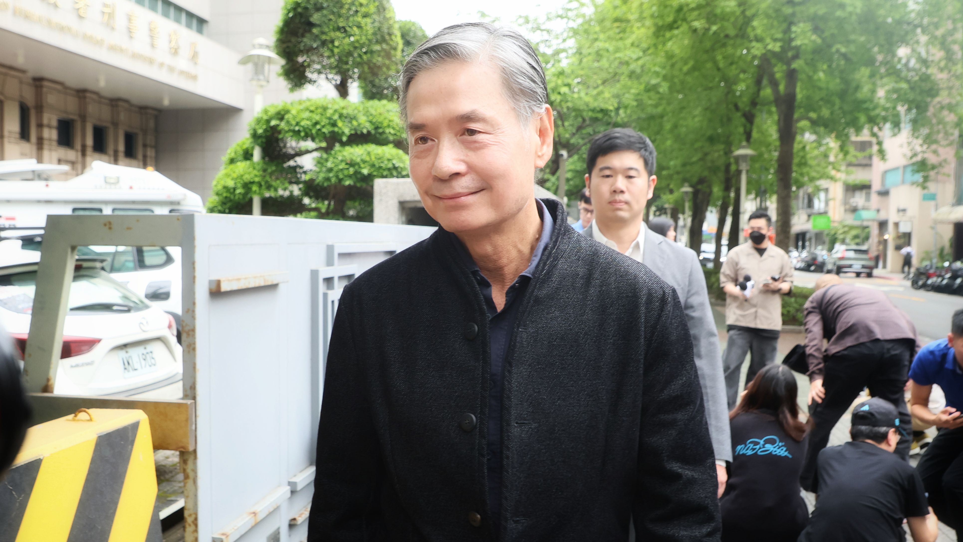 20260331-國安會前秘書長金溥聰31 日至刑事警察局對AI生成的抹黑影片及名嘴提告。（柯承惠攝）