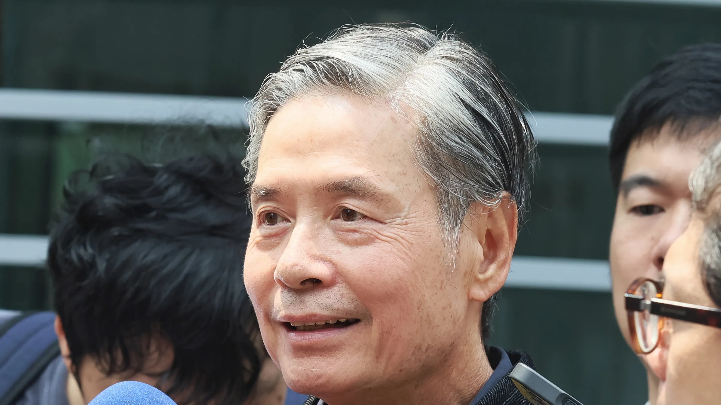 20260331-國安會前秘書長金溥聰31 日至刑事警察局對AI生成的抹黑影片及名嘴提告。（柯承惠攝）