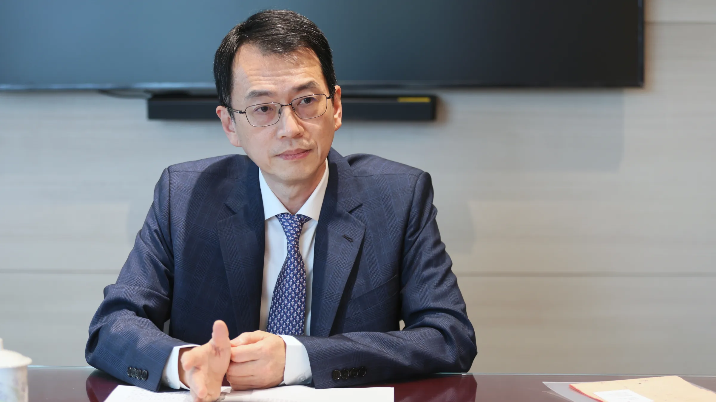 面對詐騙升級，銀行風控標準持續提高，童政彰認為「安全性不能退讓。」，近年也持續要求銀行強化異常交易監控。(攝影：柯承惠)