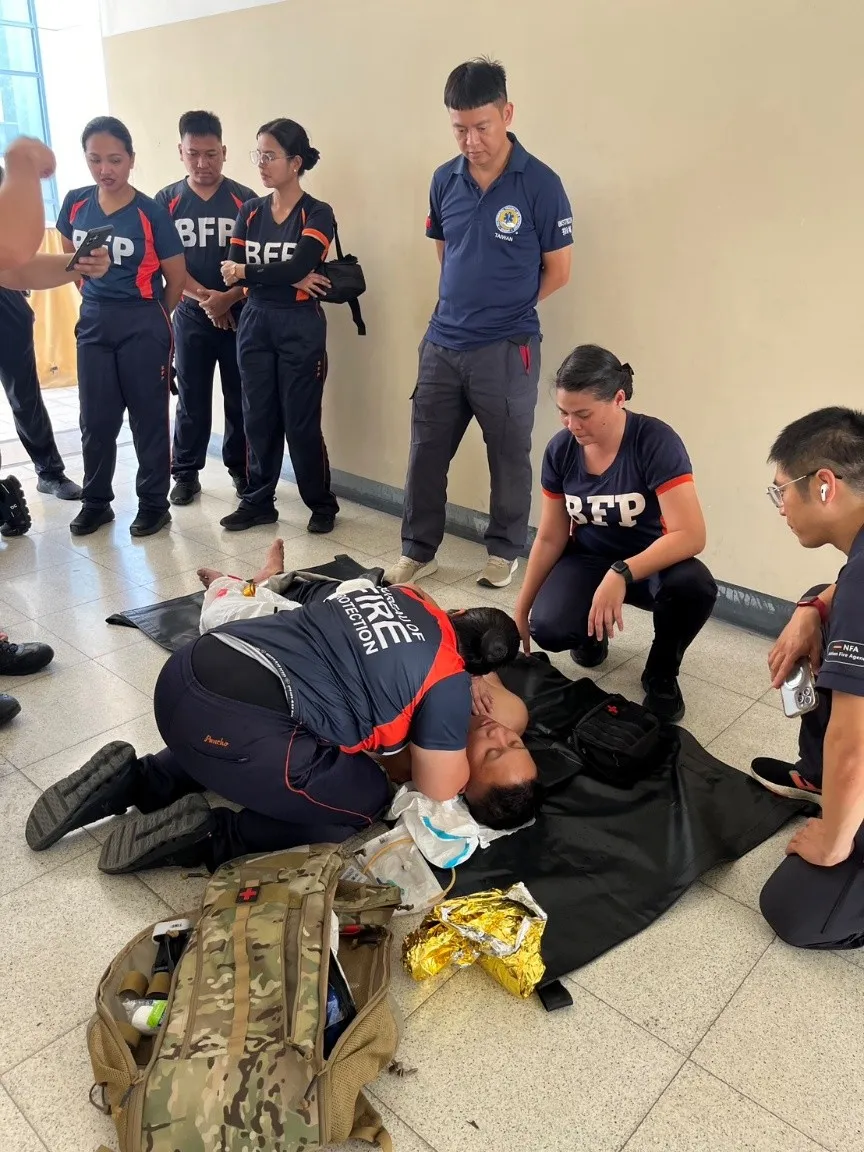 BFP trainees practice casualty assessment during a TECC exercise. (Provided by TAEF)