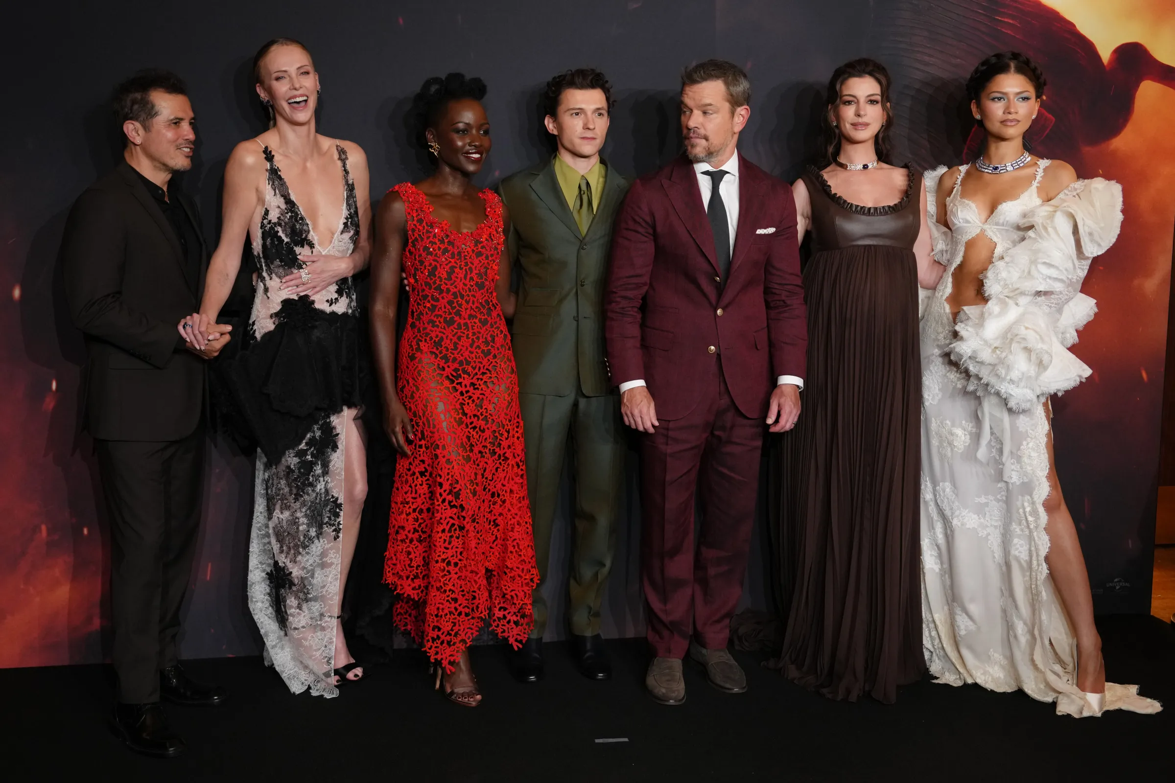 John Leguizamo, from left, Charlize Theron, Lupita Nyong'o, Tom Holland, Matt Damon, Anne Hathaway and Zendaya pose for photographers upon arrival at the premiere of the film 'The Odyssey' on Wednesday, July 8, 2026, in Paris. (AP)