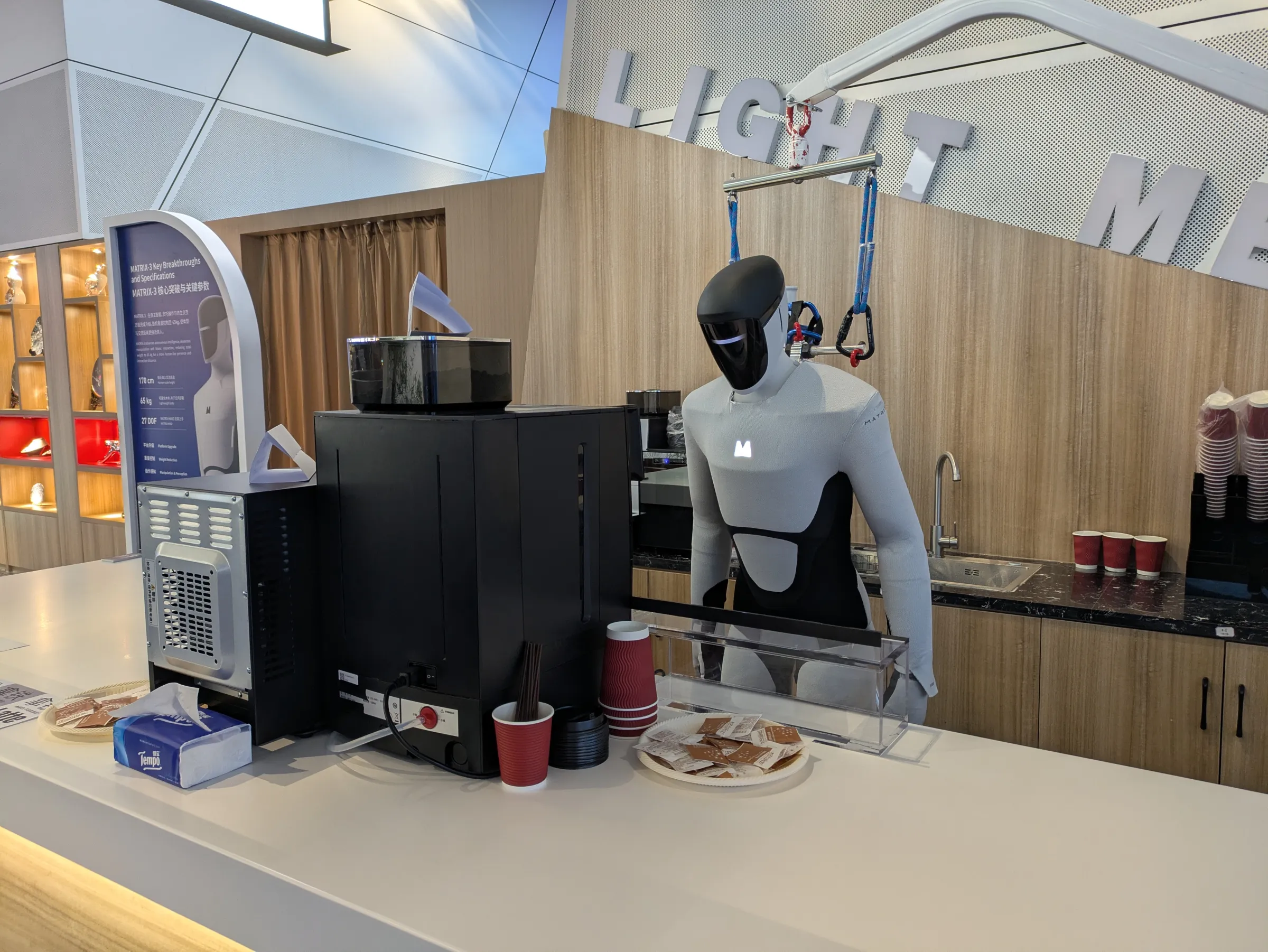 Shanghai startup Matrix Origin deployed its Matrix-3 robot at the venue for a coffee performance at 8:30 a.m., though it spent most of its time idle. (Photo by Jason Wang)