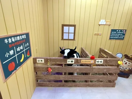 美村樂樂牧場志工體驗趣任務牛棚處 。（圖／臺中市政府社會局提供）