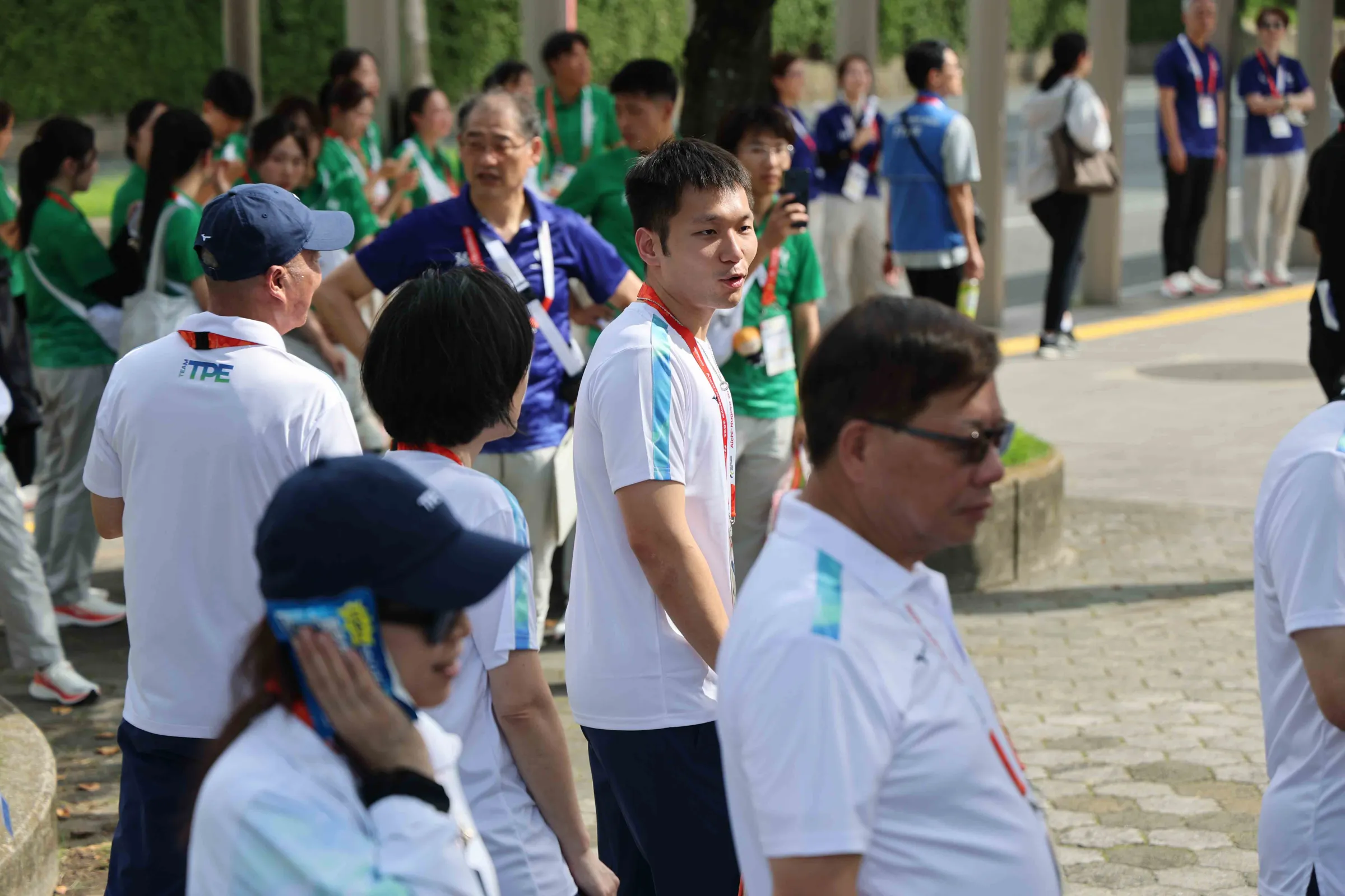 愛知・名古屋亞運18日舉行代表團歡迎儀式，運動部長李洋原定出席，現場卻傳出工作人員稱OCA不讓李洋進場；台灣方面要求提出正式依據未果，儀式一度中斷。（圖／中華奧會提供）