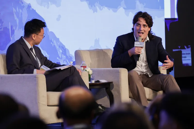 Palmer Luckey, right, answers questions from National Security Council Deputy Secretary-General Lin Fei-fan, who moderated the session at the Presidential Office defense resilience forum in Taipei on September 19, 2026.