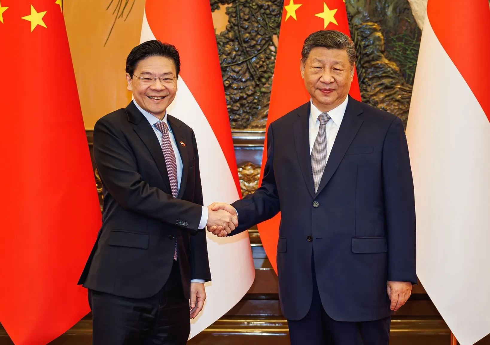 新加坡總理黃循財(左)訪問中國,與國家主席習近平會面。(翻攝自黃循財官方X粉專)