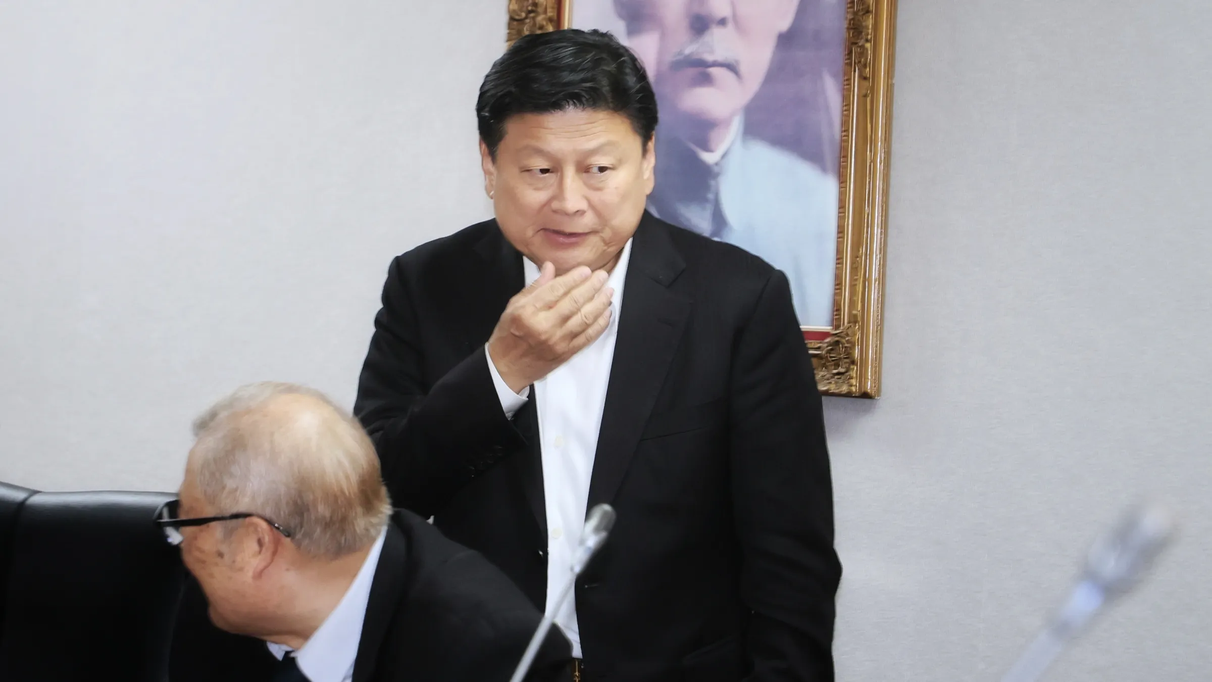 KMT legislator Fu Kun-chi attends a cross-party caucus negotiation at the Legislative Yuan on February 24.