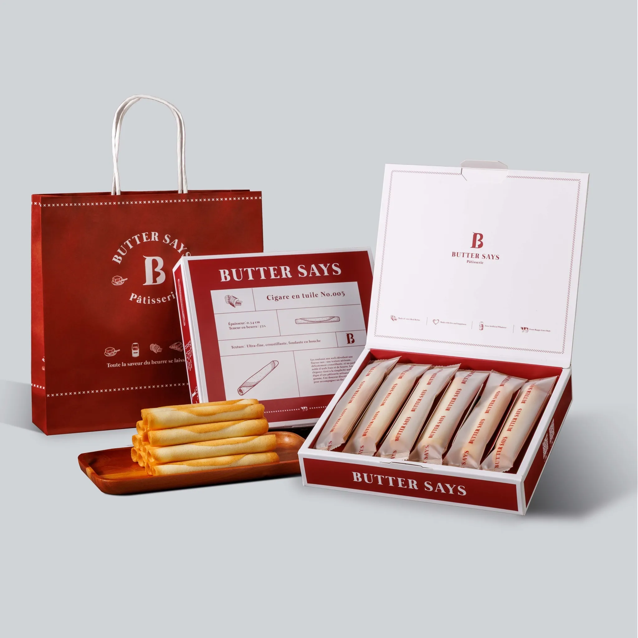 ButterSays人氣商品「海鹽芝士雪茄捲禮盒」(12入/售價450元),以層層薄脆餅皮包裹濃郁芝士香氣,再以海鹽點綴整體風味,讓甜與鹹取得恰到好處的平衡,每支獨立包裝,封存剛出爐般的口感輕盈酥脆。(圖_ ButterSays 提供)