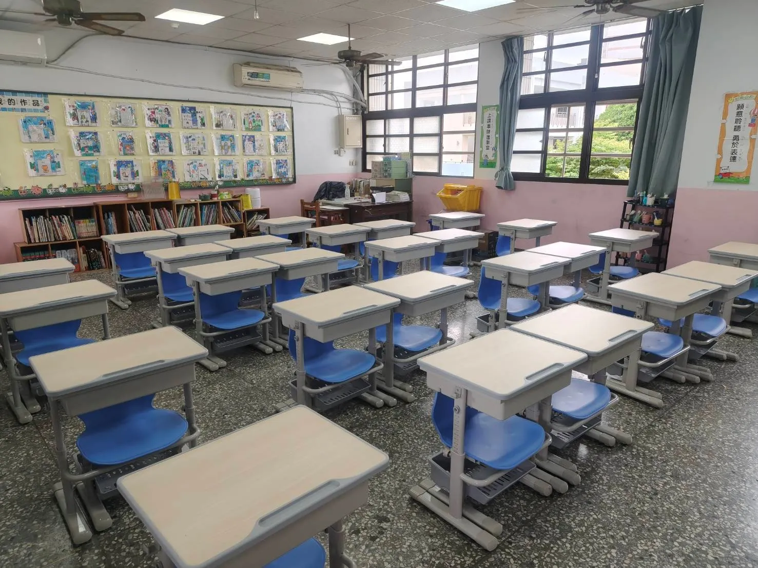 臺中市政府「陪你長大~全面採用可調式課桌椅」計畫,可依學生不同成長階段的身高及體型調整高度。(圖/臺中市政府教育局)